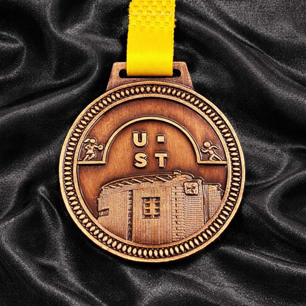 Custom embossed metal medal with raised logo design for sports and corporate awards